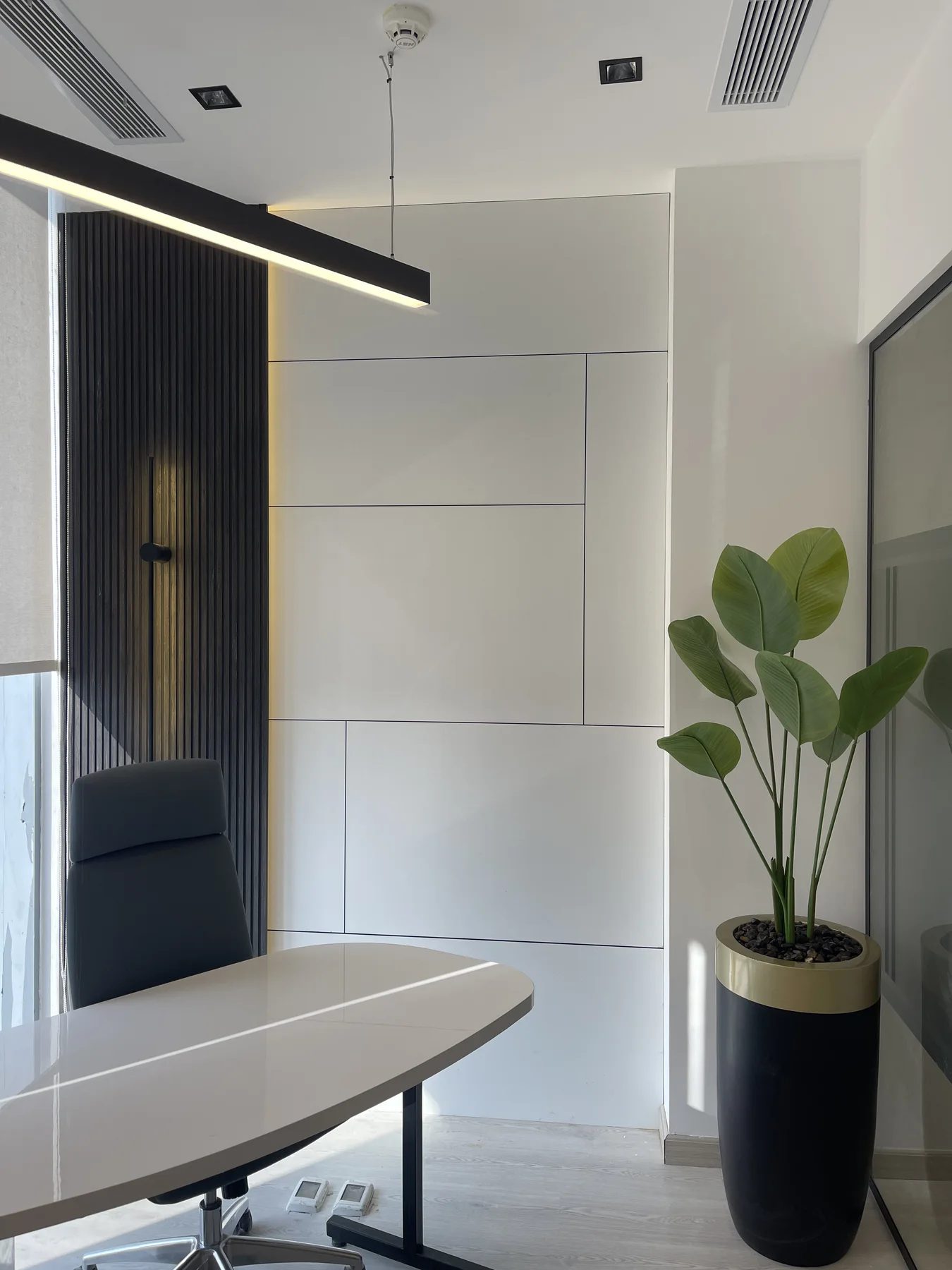 Timber wall and workstation detail in the CFC office
