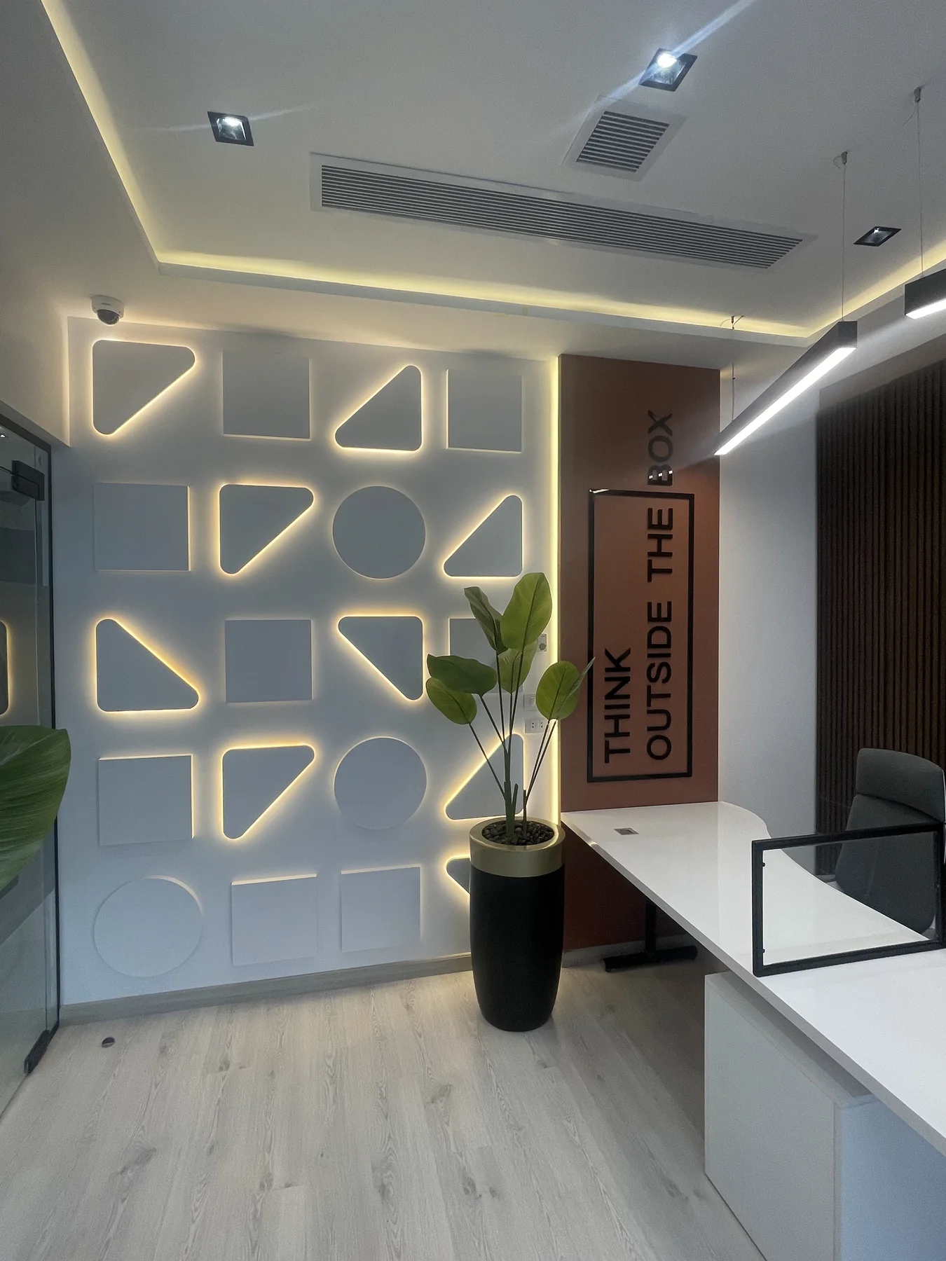 Timber details and layered lighting define this CFC office setting.
