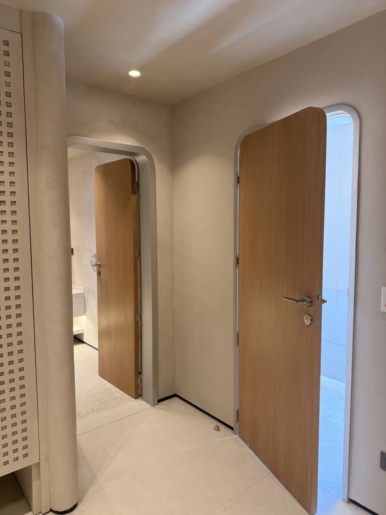 A tailored Playa joinery composition showing measured storage and calm material rhythm.