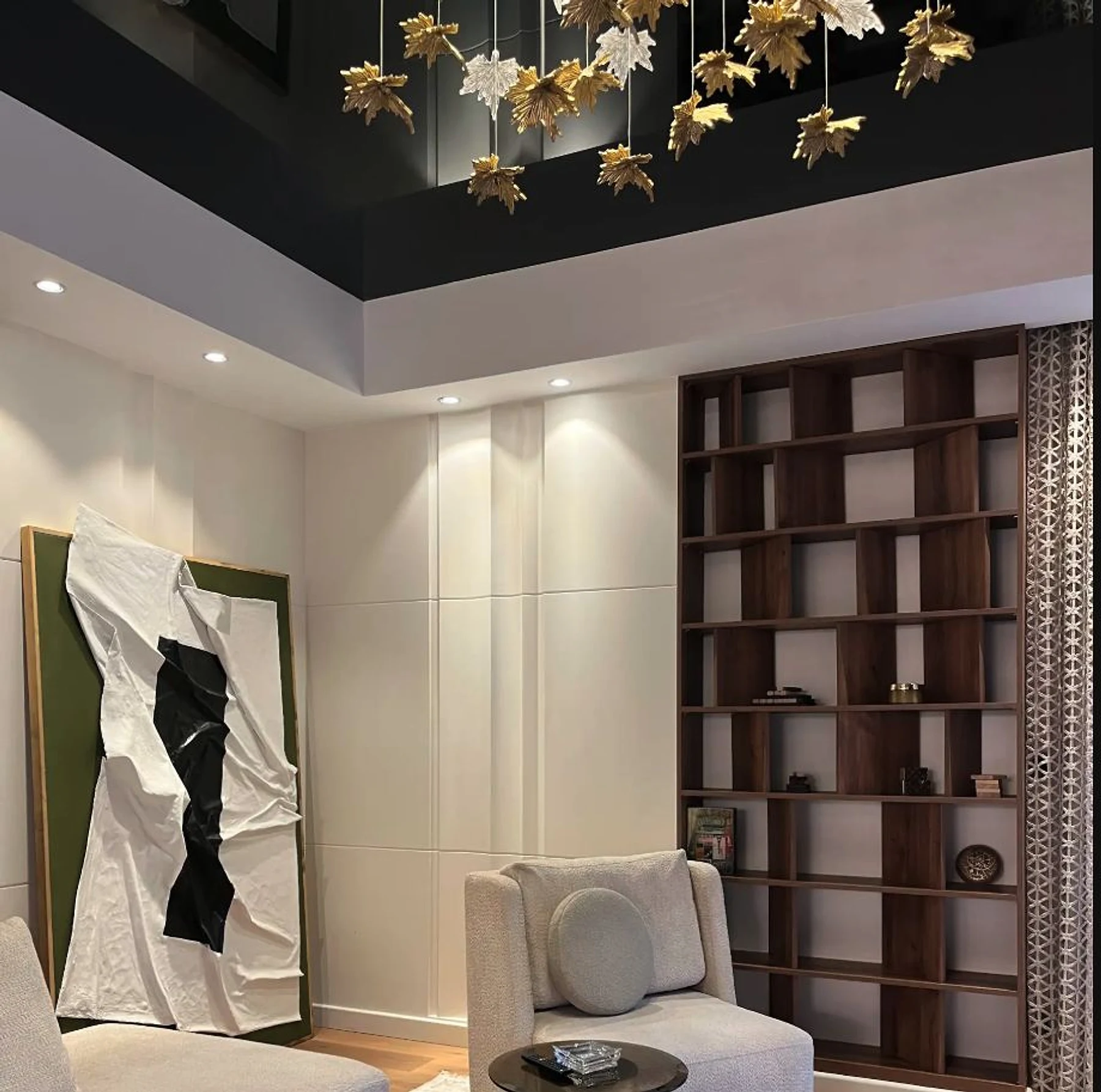 Full-height joinery adds storage and display to the living room.