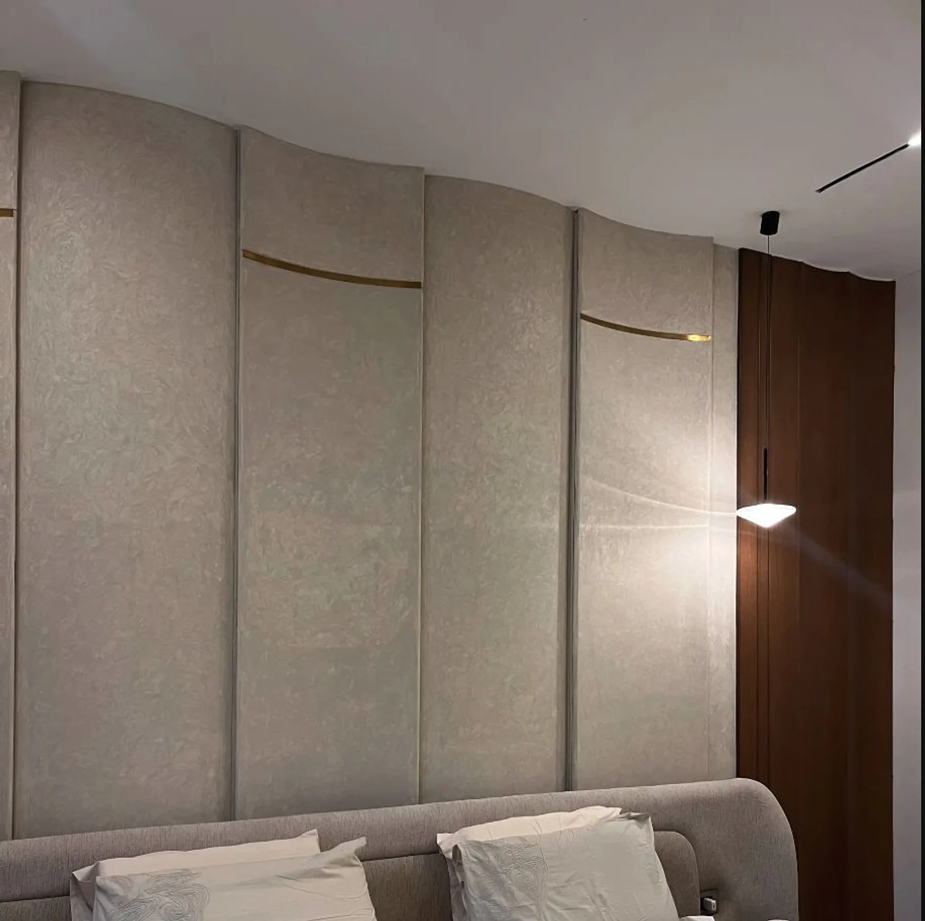 A bedroom headboard and wall package continuing the same timber language.