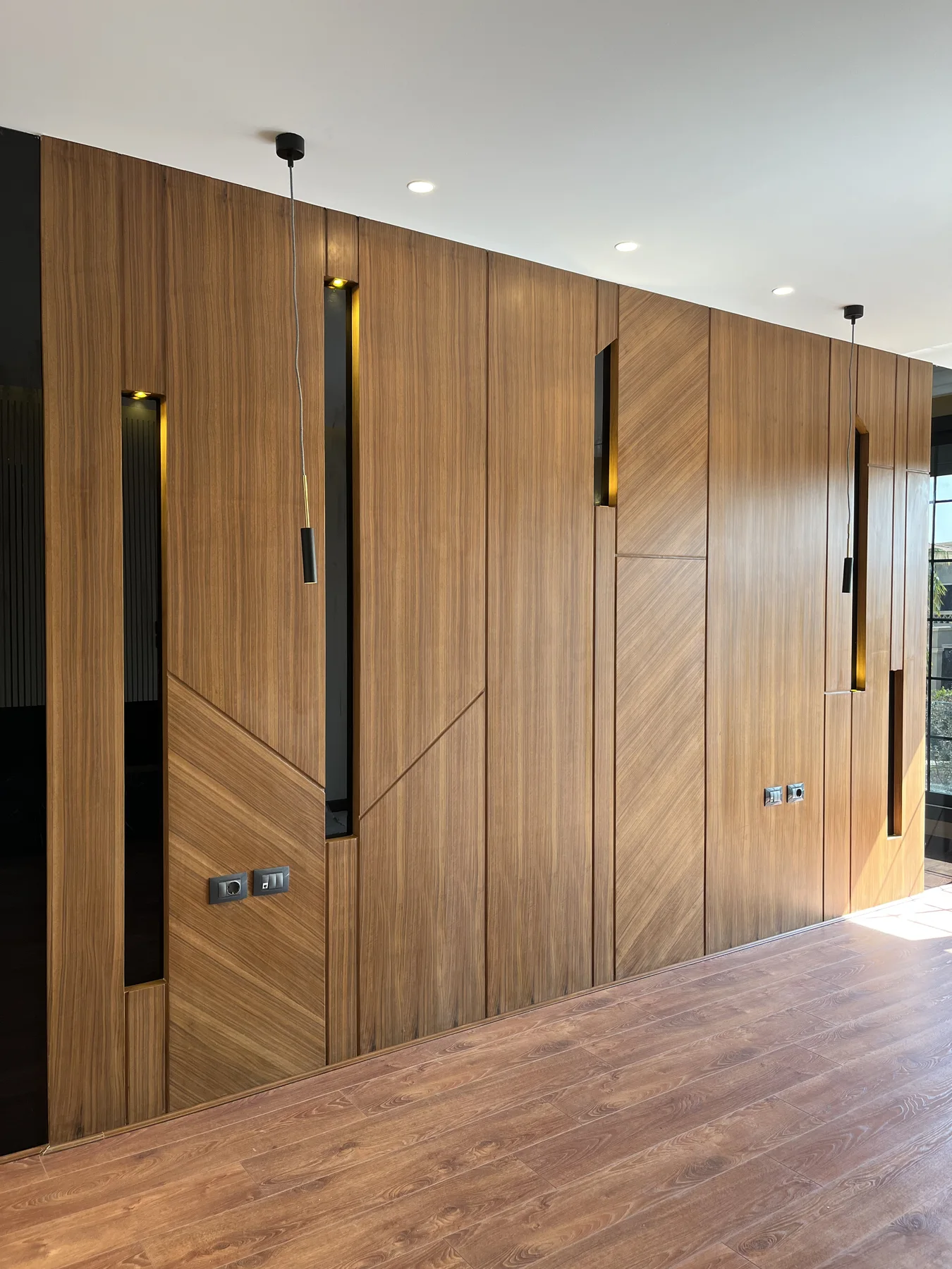 A dining setting carried by continuous timber lines and considered proportion.