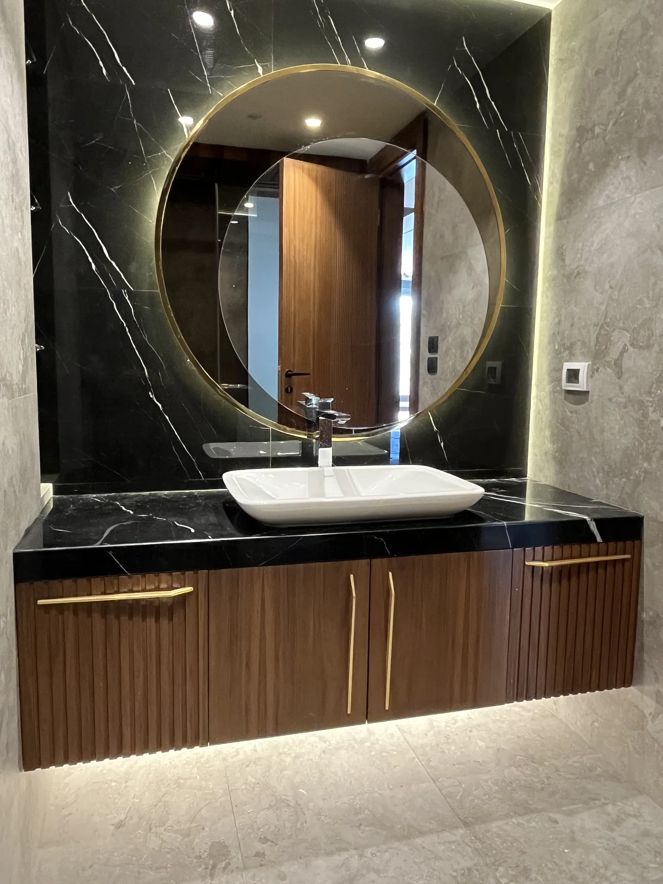 Layered joinery and architectural light shape this Swan Lake interior.